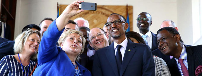 Participants in the MDG Advocates meeting, in Kigali, take a selfie. Included are (left-right) Norwegian Prime Minister Erna Solberg, Rwandan President Paul Kagame, and UNFPA Executive Director Dr. Babatunde Osotimehin. Photo credit: Paul Kagame/Flickr
