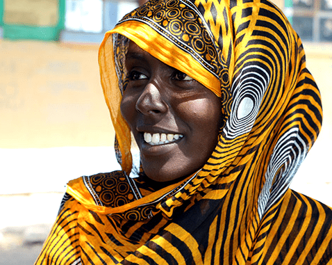 A young woman in bright yellow headscarf.