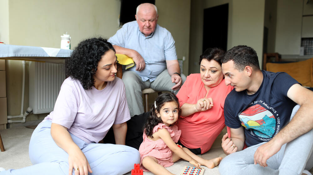 The three generations of the Koberidze/Modebadze family in Georgia. The family includes parents Tako and Lasha, their 2-year-old daughter Kesane, and grandparents Neli and Amiran.