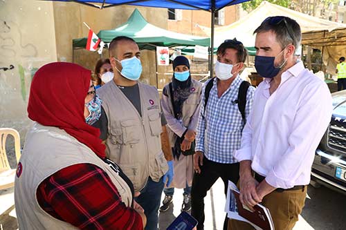 Members of a Canadian delegation visit a mobile medical unit.