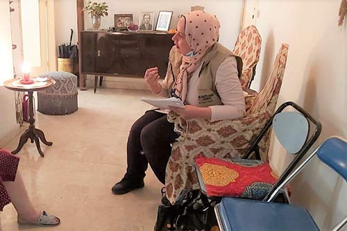 A woman speaks to a blast-affected individual in Beirut.