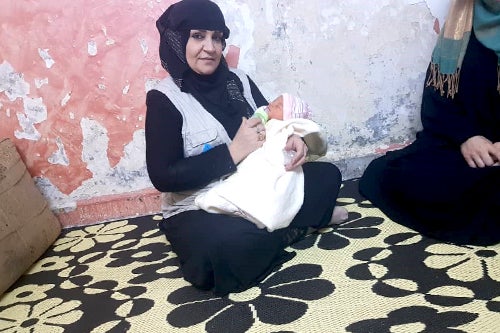 https://www.unfpa.org/sites/default/files/Midwive_Hanan_wz_new_baby_born_embed.jpg