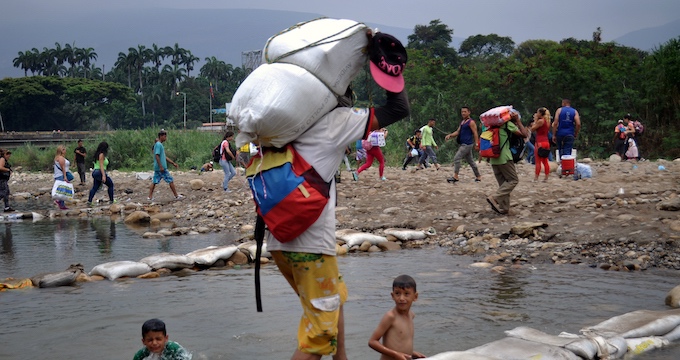 Venezuelan volunteers provide humanitarian relief to migrants, refugees
