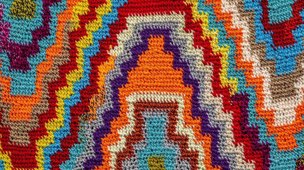 A brightly coloured pyramid pattern.