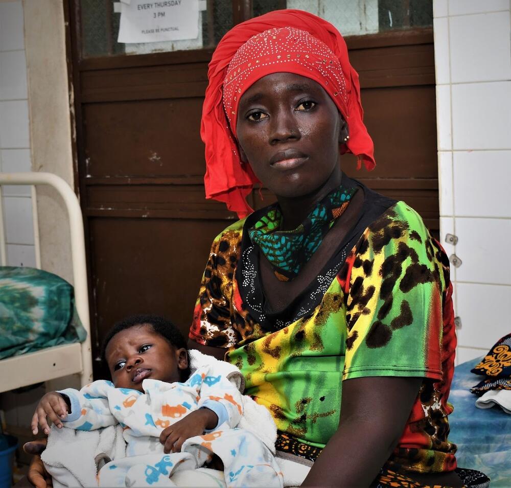 Woman holding child