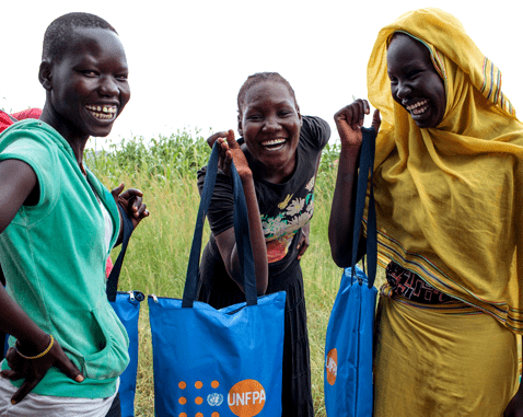Adolescent girls with UNFPA Dignity Kits.