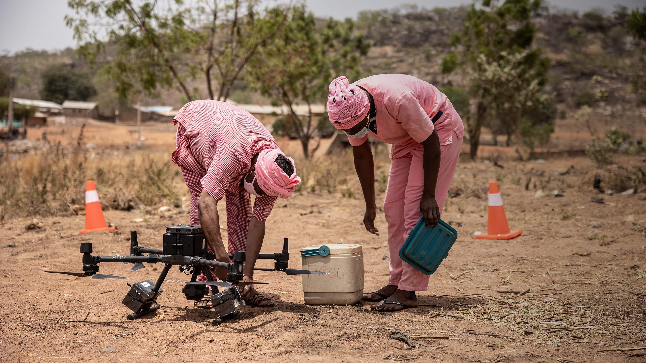 Health innovations, like the rapid development of COVID-19 vaccines, also proved essential in 2021. Here, in Benin, midwives offload medical supplies from a drone in the Firou maternity health centre, part of a pilot programme to deliver vital medicines and blood to isolated areas.