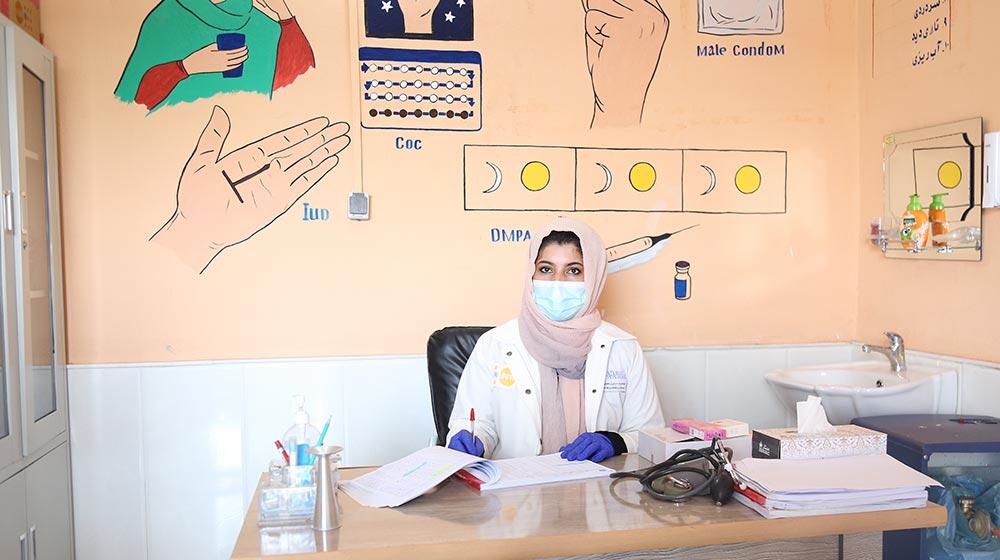 As Afghanistan grapples with surge in COVID-19 cases, one midwife shares her strength