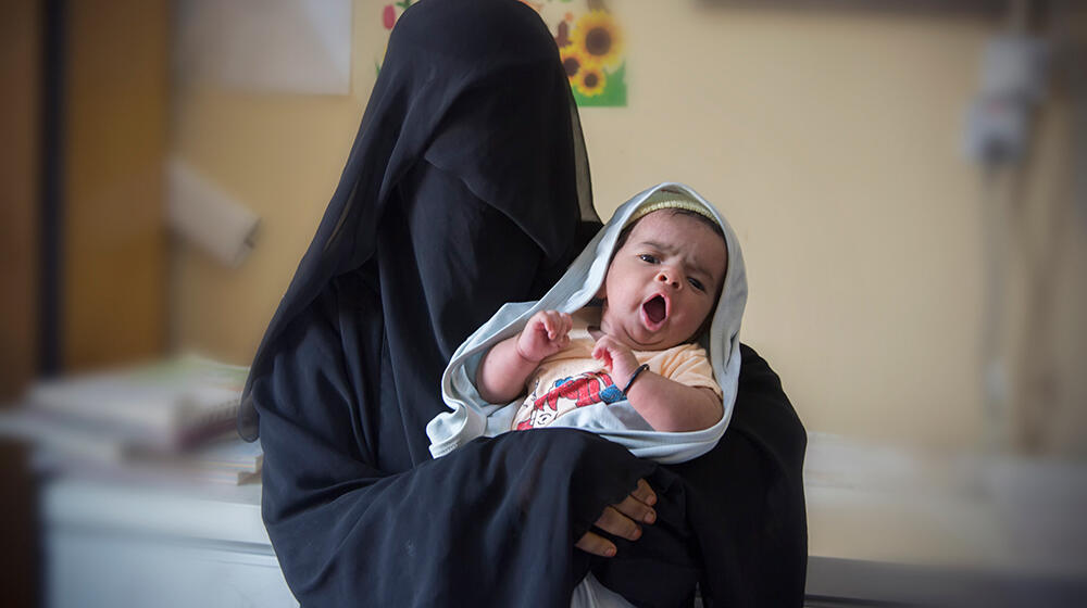 A woman and her newborn at a UNFPA-supported health centre. More than 100 health facilities are at risk of closing. © UNFPA Yemen