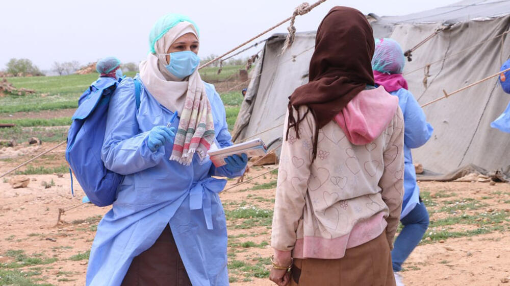 Outreach workers in Syria are raising awareness about the pandemic. © UNFPA Syria