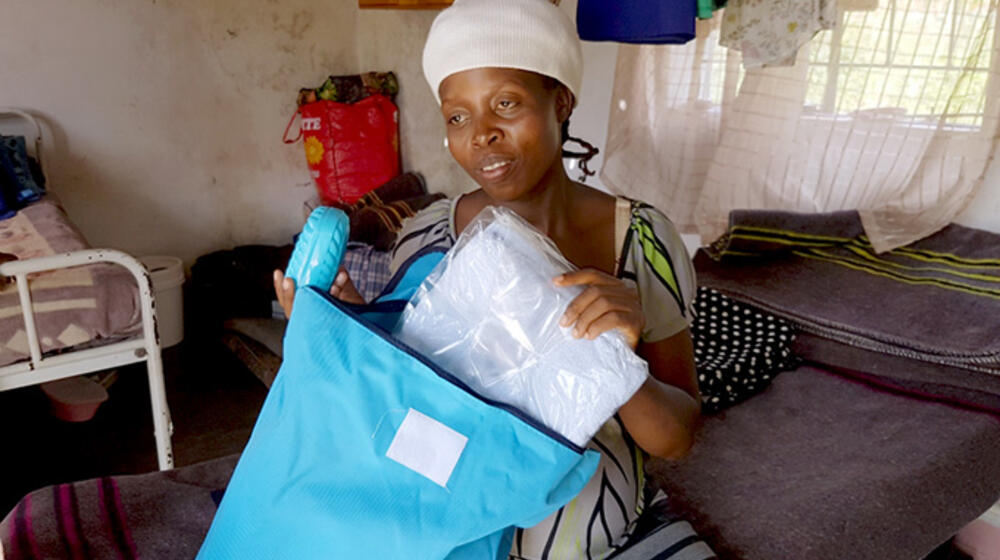 "We lost all our belongings – including the new clothes we had bought for the baby," Tatenda Sithole, from Rusitu. © UNFPA Zimbabwe